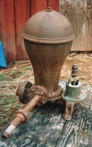 Antique cast iron water ram 
(Goulds)