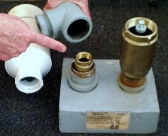 Tank-mount 'tee' removes easily 
to get to the interior check valve.